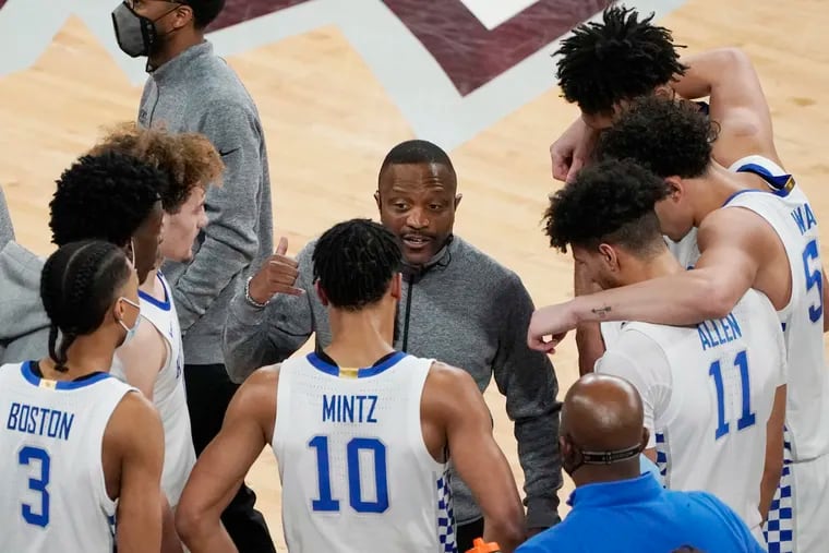 Kentucky assistant coach Bruiser Flint speaking with the players after stepping in for head coach John Calipari, who was ejected in a game against Mississippi State on Jan. 2, 2021.