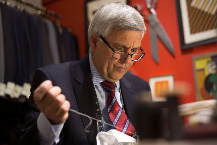 Sergio Martins sews a suit jacket at Boyds on Chestnut. He joined Boyds in 1999, and offers the opposite of fast fashion. "There's not many of us left," Martins says.