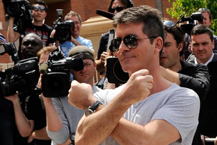 X marks the spot on a treasure map, and what a treasure Simon Cowell has landed with "X Factor." (Ray Mickshaw / FOX)