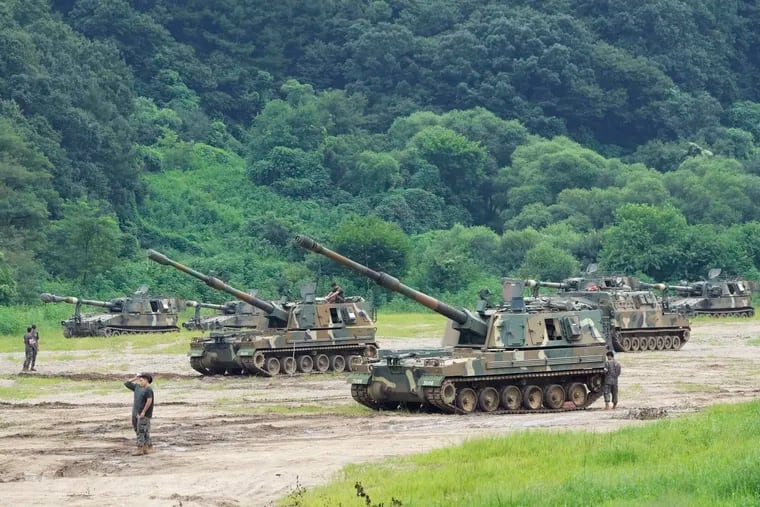 South Korean army K-9 self-propelled howitzers take positions in Paju, near the border with North Korea, South Korea, on Monday.