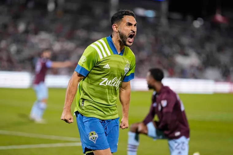 The Seattle Sounders' Cristian Roldan celebrates after scoring a goal against the Colorado Rapids last Wednesday.