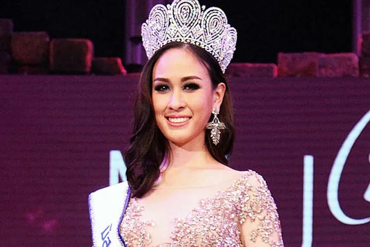 Weluree Ditsayabut poses after she was crowned Miss Universe Thailand at the competition in Bangkok, Thailand. Weluree has resigned less than a month into her reign after being harshly criticized on social media over her political comments and looks. (AP Photo)