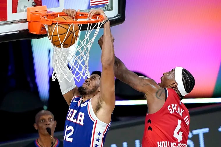 The 76ers' Tobias Harris (left), scoring in front of Toronto's Rondae Hollis-Jefferson, will be utilized in a variety of ways under new head coach Doc Rivers.