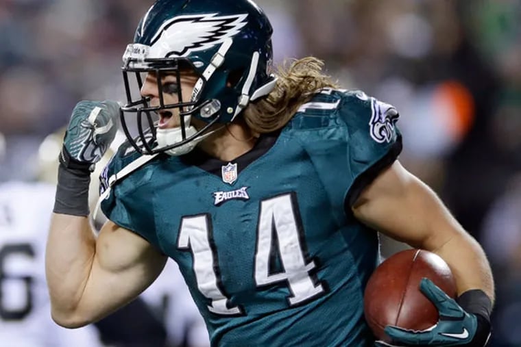 Riley Cooper celebrates after scoring a touchdown during the first half of an NFL wild-card playoff football game against the New Orleans Saints, Saturday, Jan. 4, 2014, in Philadelphia. (Michael Perez/AP)