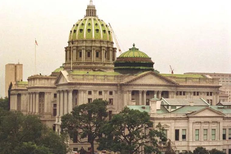 This is an exterior view of the Pennsylvania State Capitol building in downtown Harrisburg, Pa.