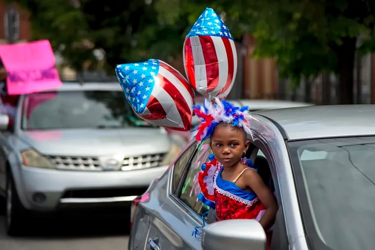 Students pass the B'ella Ballerina Dance Academy during the studio's drive-by recital May 24, 2020. They usually have an end of year recital and banquet but the coronavirus pandemic changed that this year. But owner/founder Roneisha Smith-Davis said "the show must go on!"

Just in a different way.