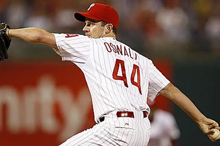 Since being traded by the Astros, Roy Oswalt is 3-1 with a 2.43 ERA for the Phillies. (Yong Kim / Staff Photographer)