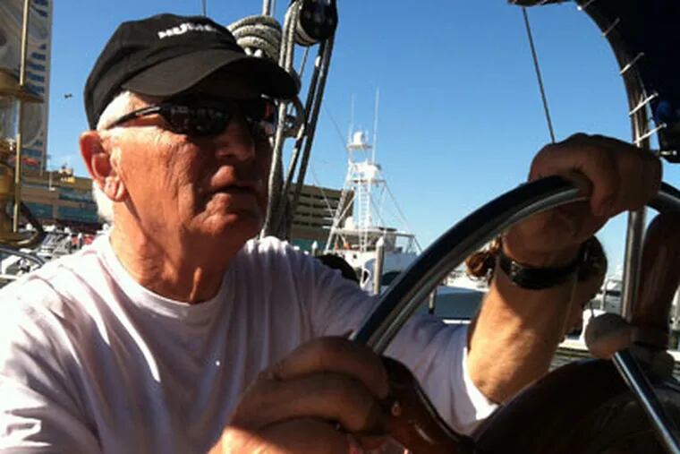 Capt. Herb Anmuth at the helm of the Naughy Nestor sail boat, setting sail from the Farley State Marina.