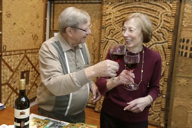 Walter and wife Mary Deuschle have an afternoon glass of wine in his Huntingdon Valley home studio on December 1, 2016.
