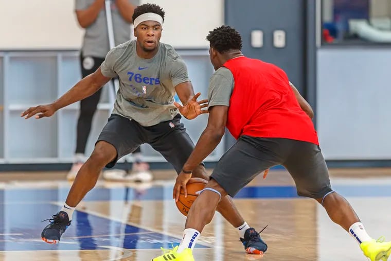Terence Davis, left, from Ole Miss, guards Luguentz Dort, right, from Arizona State, during a scrimmage at the Sixers pre-draft workout on June 3, 2019 at their Camden, NJ, practice facility.