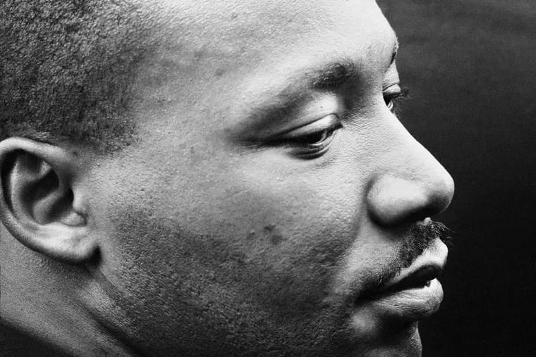 This August 1963 photo provided by the Dan Budnik Estate and taken by photographer Dan Budnik of Martin Luther King, Jr. deep in meditation after delivering his greatest speech “I Have a Dream” at the March on Washington.