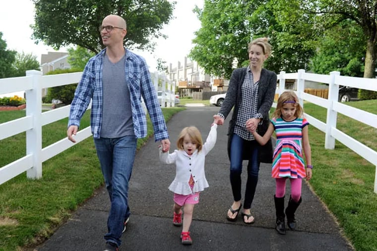 Erika and Michael Zorn with daughters Lily, 2, and Emma, 6. The couple faces charges for possessing and manufacturing marijuana that the young wife used to relieve debilitating symptoms. (TOM GRALISH/STAFF PHOTOGRAPHER)