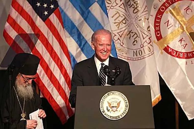 Vice President Joe Biden is introduced by his Eminrence Archbishop Demetrios of America *( R  ) at the Grand Banquet of the 42nd Biennial Clergy-Laity Congress of the Greek Orthodox Archdiocese of America in Philadelphia Wednesday July 9, 2014. ( DAVID SWANSON / Staff Photographer )