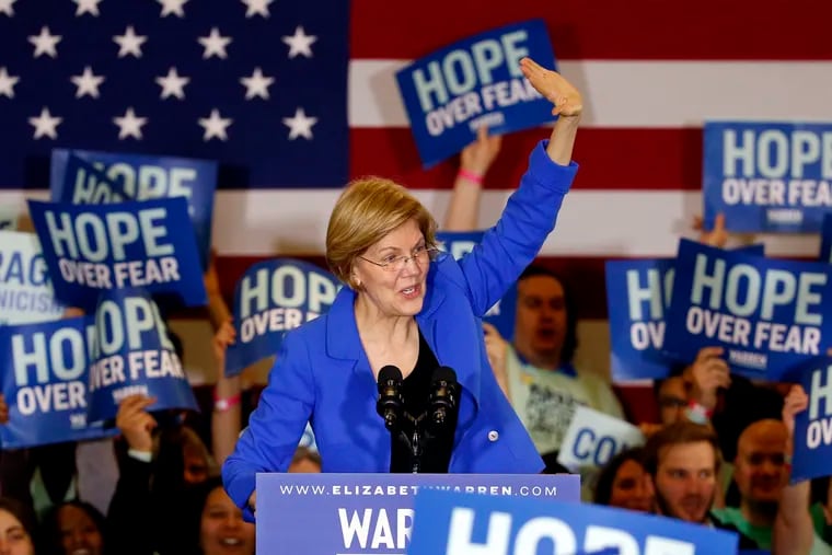 Democratic presidential candidate Elizabeth Warren speaks to supporters at a caucus night campaign rally in Des Moines, Iowa, on Feb. 3, 2020.