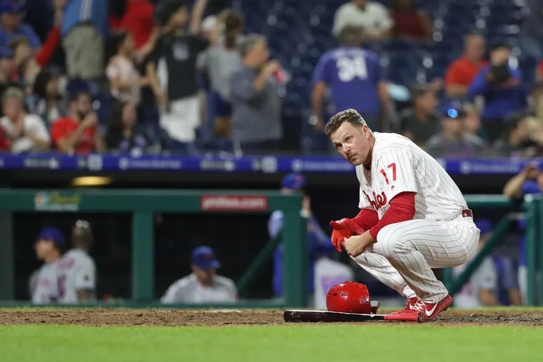 Phillies' slugger Rhys Hoskins kneels after striking out against the Mets on Sept. 18.