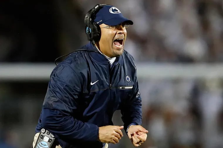 Penn State head coach James Franklin, reacts after the extra point is good against Ohio State during the second half of an NCAA college football game in State College, Pa., Saturday, Oct. 22, 2016. Penn State won the game 24-21.