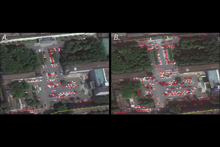 Satellite images show cars (highlighted in red) and trucks (yellow) in the parking lot of a Wuhan, China, hospital in October 2018, left, and October 2019. Researchers say these and other images of increased traffic in October 2019 suggest the coronavirus may have originated then, months earlier than it was reported.