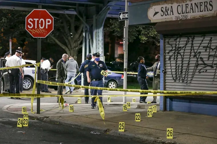 Police work the crime scene where 7 people were shot with one fatality on the 4900 block of Frankford, Thursday, October 8, 2020