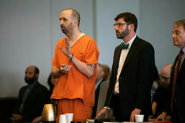 Craig Hicks pleads guilty to first-degree murder in the 2015 murders of three young Muslims at a Chapel Hill apartment Wednesday, June 12, 2019 at the Durham County Courthouse. Hicks will serve a life sentence in prison without the possibility of parole for killing his neighbors at the Finley Forest Condominiums: Deah Barakat, 23, his wife Yusor Abu-Salha, 21, and her sister Razan Abu-Salha, 19.  (Travis Long/The News & Observer via AP)