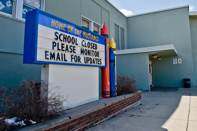 A sign announcing an elementary school in Helena, Mont., is closed.