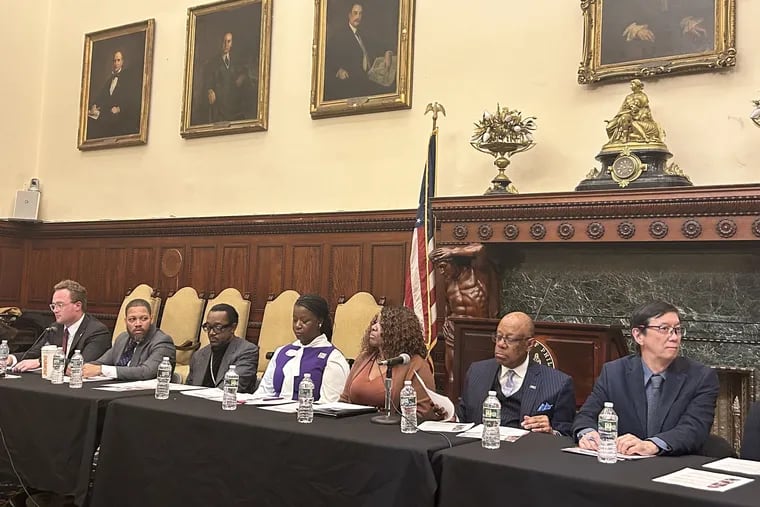 L-R John Dolan, from the Parker administration, Otis Bullock Jr., Bishop Louis Felton, Atiyah Harmon, Robin Cooper, Harold Epps and Andy Toy - six of the 13 members of Mayor Cherelle L. Parker's Education Nominating Panel.