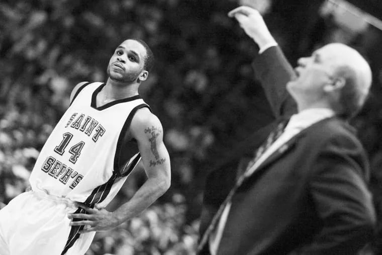 Jameer Nelson, coach Phil Martelli, and the Hawks knocked off Chris Paul and Wake Forest in the third round of the 2004 NCAAs. "We moved people," Martelli said.