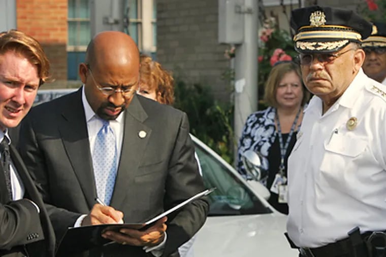 Michael Nutter at the beginning of August, taking notes before a press conference on the impact of “Plan C.” (Daily News file photo)