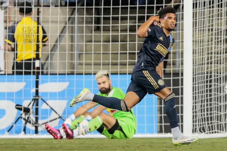 Union Nathan Harriel celebrates his goal against Red Bulls goalie Carlos Miguel Coronel during the second half of the Union's Leagues Cup win on Tuesday.