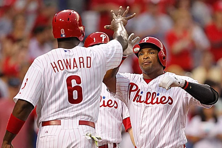 Phillies first baseman Ryan Howard and right fielder Marlon Byrd. (Ron Cortes/Staff Photographer)