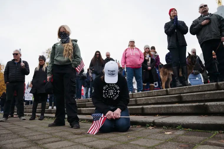 Supporters of President Trump hold a "Stop the Steal" event at the Oregon Capitol on Saturday. Protests were held nationwide over Trump and his supporters' unsubstantiated claims of voter fraud.
