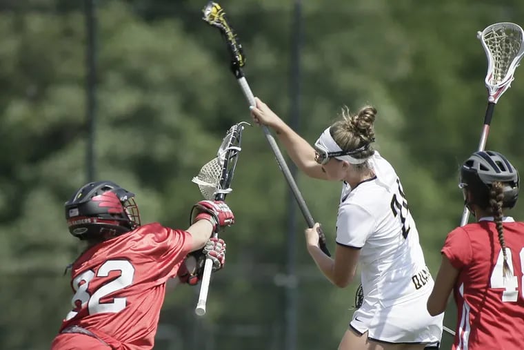 Moorestown’s Ashley Nutt scores on Ocean City goalie Abbey Fenton in the Quakers victory in the South Jersey Group 3 title game.