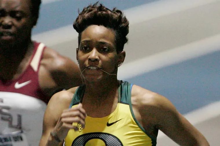Oregon's English Gardner runs past Florida State's Marecia Pemberton to secure a spot in the finals of the 60-meter dash during the NCAA indoor track and field championships on Friday, March 9, 2012 in Nampa, Idaho. (Matt Cilley/AP file)