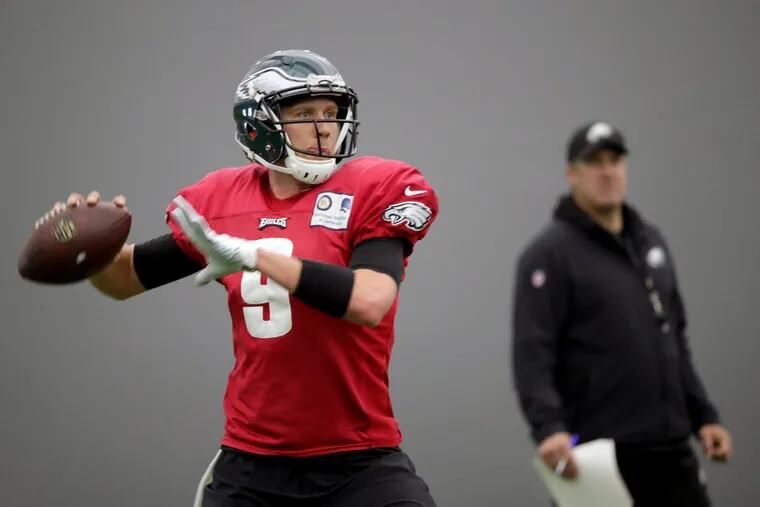 Nick Foles throws a pass at an Eagles practice last week at the NovaCare Complex. DAVID MAIALETTI / Staff Photographer