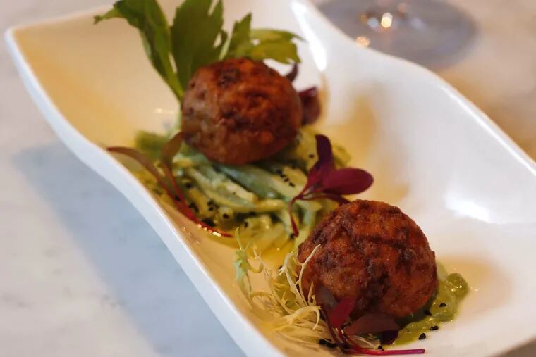 Celeriac fritters at Vedge are golden crisp balls uncannily reminiscent of fried conch.
