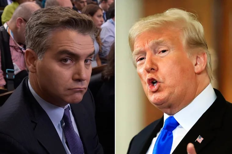 The White House removed the press credentials of CNN corespondent Jim Acosta (left) after a heated exchange with President Trump last week.