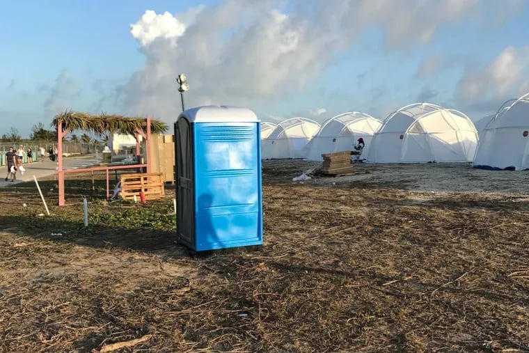 This photo provided by Jake Strang shows tents and a portable toilet set up for attendees for the Fyre Festival in the Exuma islands, Bahamas. Organizers of the much-hyped music festival in the Bahamas canceled the weekend event at the last minute Friday after many people had already arrived and spent thousands of dollars on tickets and travel. A statement cited &quot;circumstances out of our control,&quot; for their inability to prepare the &quot;physical infrastructure&quot; for the event in the largely undeveloped Exumas.