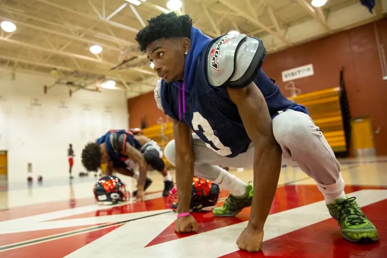 Willingboro receiver/defensive back Chris Long stretches at practice in October. He has committed to Rutgers after dropping Temple.