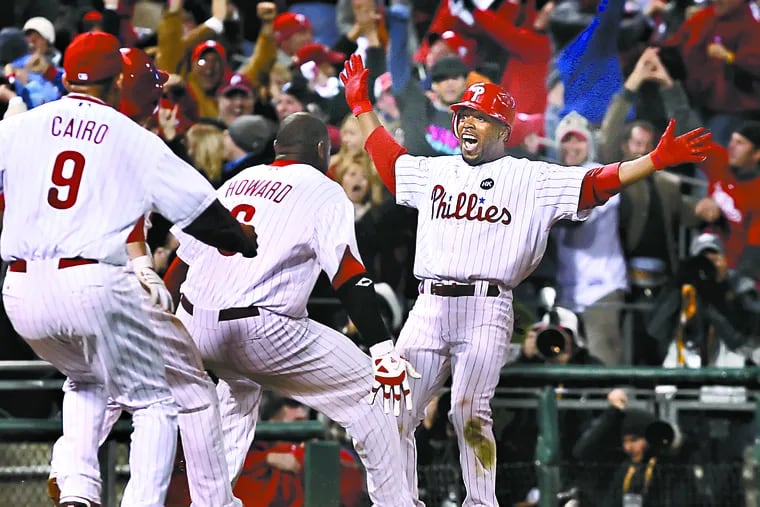 Jimmy Rollins celebrates his game-winning hit with Ryan Howard on Oct. 19, 2009.