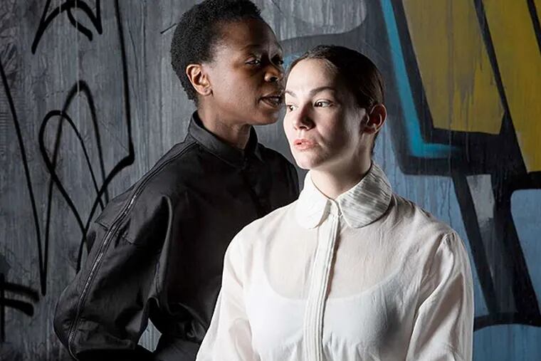 Zainab Jah (left) and Sarah Gliko in &quot;Hamlet&quot; at the Wilma Theater. (Alexander Iziliaev)