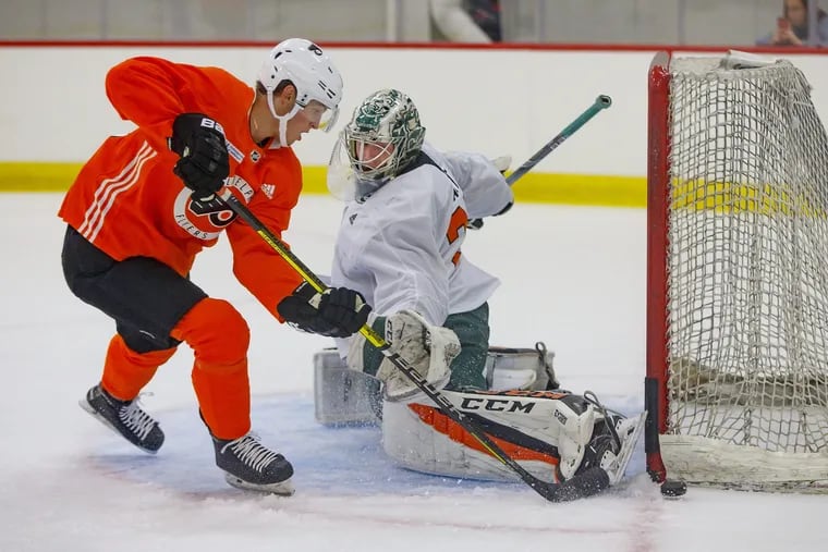 Flyers goalie prospect Carter Hart makes a save during one of the three- on-three games at the team's development camp Monday.