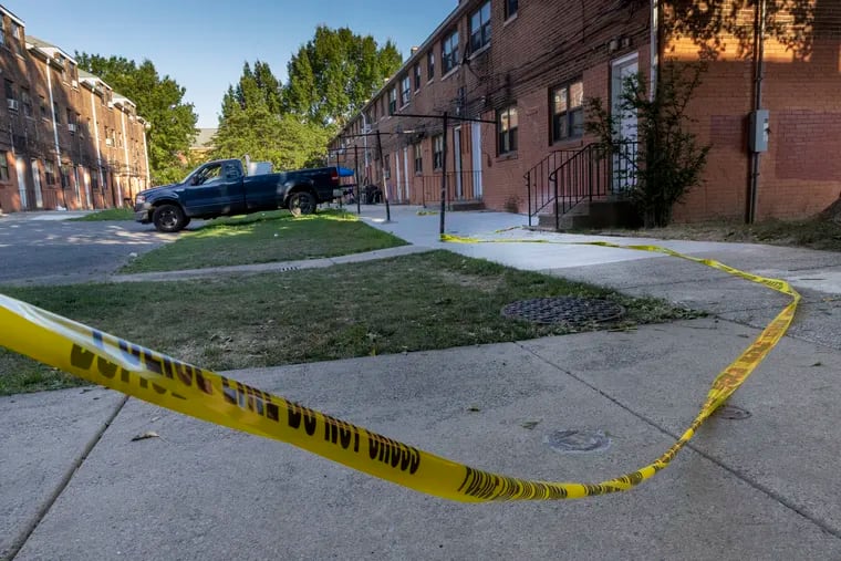 Police crime scene tape left behind at the scene of a shooting at Spring Garden Homes in Philadelphia. The shooting took place near 2 a.m. Thursday, sending four teens to the hospital with injuries.