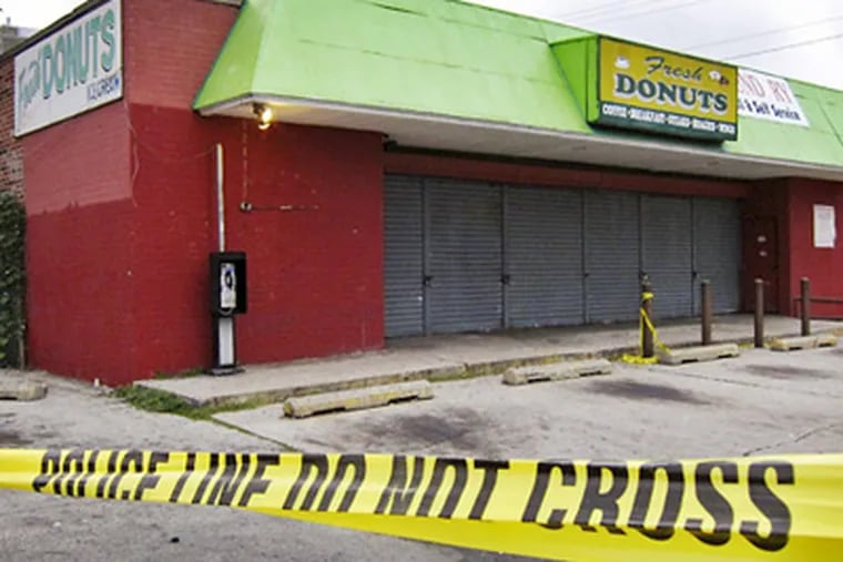 The site of the homicide: Fresh Donuts and Laundry Full & Self Service, at North 15th Street at Wyoming Avenue. (Alejandro A. Alvarez/Staff Photographer)