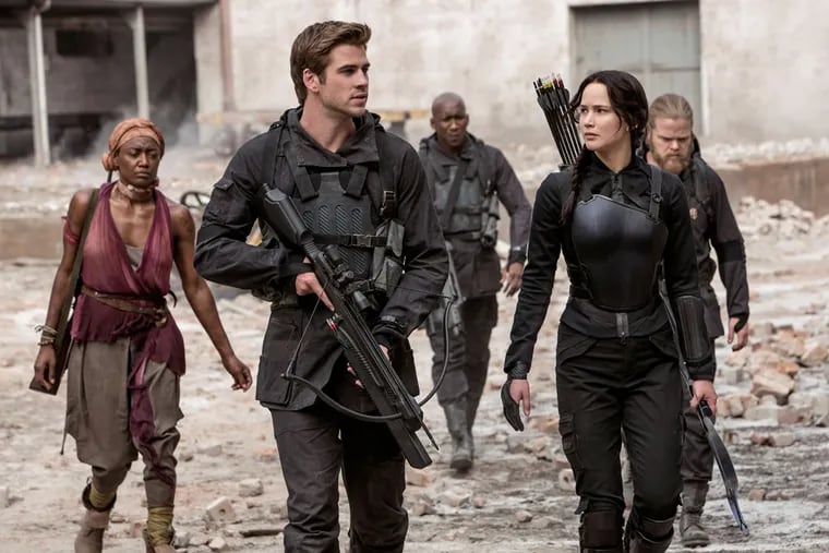 Take the point: Jennifer Lawrence with (from left) Patina Miller, Liam Hemsworth, Mahershala Ali, and Elden Henson in the latest &quot;Hunger Games&quot; installment.