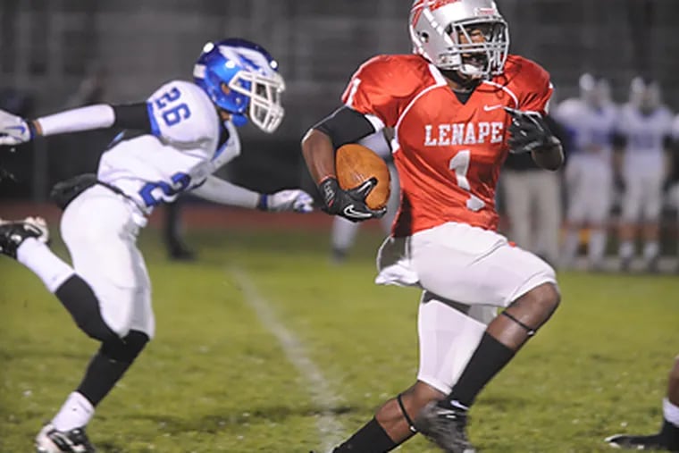 Ta'Ron Earl of Lenape runs the ball back 95 yards for a touchdown during the first play of the game. (Bob Williams For The Inquirer)
