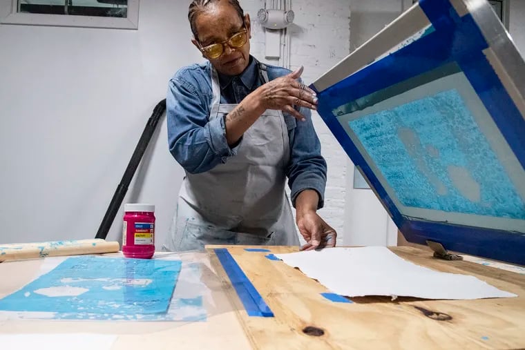 Faith Bartley make prints making posters to sell in hopes of helping raise $100,000 for the Philadelphia Community Bail Fund and the third annual Black Mama’s Bailout on May 12
