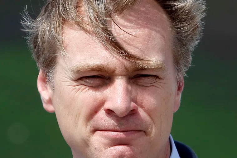 FILE - In this file photo dated Sunday, July 16, 2017, movie director Christopher Nolan poses at the premiere of the movie "Dunkirk," in Dunkirk, northern France.  Nolan is among those being recognized in Britain’s royal New Year’s Honors List, according to the list of recipients released Friday Dec. 28, 2018.