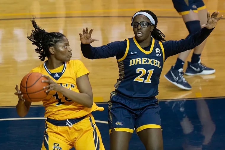 La Salle's Kayla Spruill (left), seen here in action against Drexel, led the Explorers in a 74-65 win over George Washington on Saturday at Tom Gola Arena.