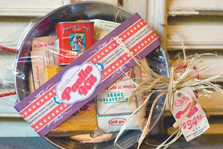A great gift idea for a food lover: Cuba Libre's Lobster Paella Kit, which includes a recipe, cooking pan, rice, seasonings, and a shopping list.