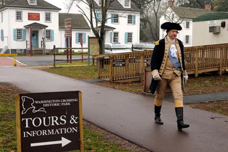 John Godzieba, dressed as Gen. George Washington, arrives at Washington Crossing park offices. (Tom Gralish / Staff Photographer)