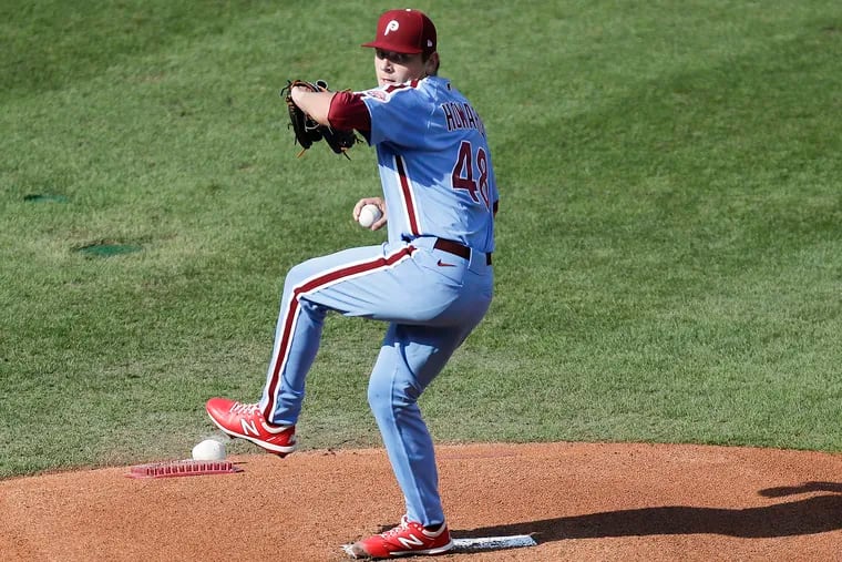 Phillies pitcher Spencer Howard uncorks a pitch during his major-league debut Sunday at Citizens Bank Park. Howard allowed four runs on seven hits in 4 2/3 innings in a loss to the Atlanta Braves.